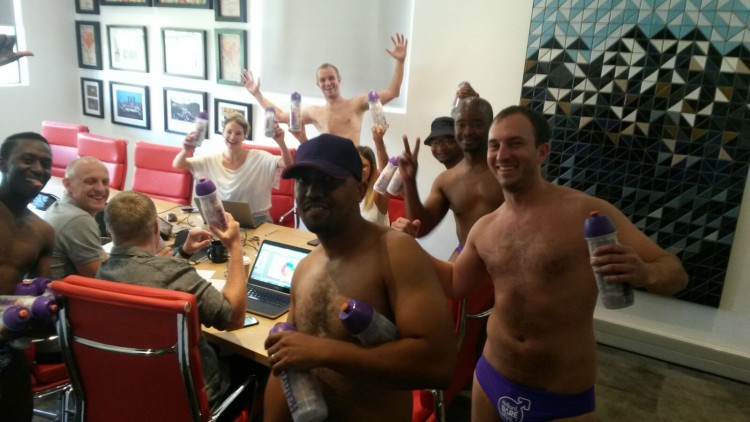 Daredevil Run participants in speedos at Nando's Central Kitchen boardroom