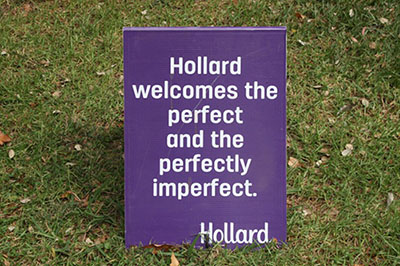 Sign reading "Hollard welcomes the perfect and prefectly imperfect"